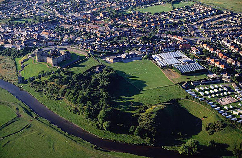 The original Rhuddlan Castle on the right with the Edwardian Rhuddlan Castle on the left. The Anglo-Saxon burgh, the Welsh llys and the Norman town were all in the fields immediately above the motte of the Castle. The Edwardian town is where modern Rhuddlan is  today. .gov.uk/cms/hwbcontent/Shared%20Documents/VTC/ngfl/history/bdag/castles/projects/castles/units/rhuddlan/imagebank/aerial_gtj.jpg